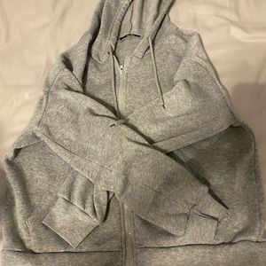 gray zip up jacket, fleece lined. Size M.